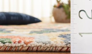 Safavieh Ikat IKT151Y Green / Rust Area Rug Detail