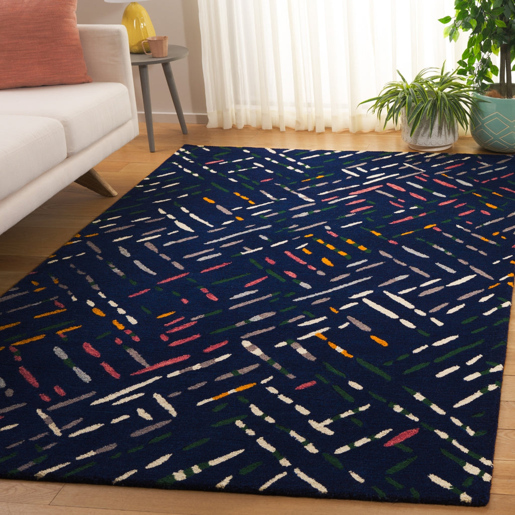 Safavieh Metro MET252N Navy / Pink Area Rug Room Scene Feature