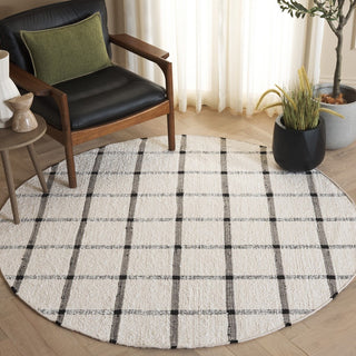 Safavieh Montauk MTK322Z Ivory / Black Area Rug Room Scene Feature