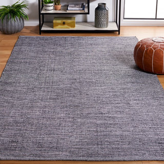 Safavieh Montauk MTK701Z Black / Ivory Area Rug Room Scene