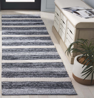 Safavieh Montauk MTK976Z Black / Ivory Area Rug Room Scene