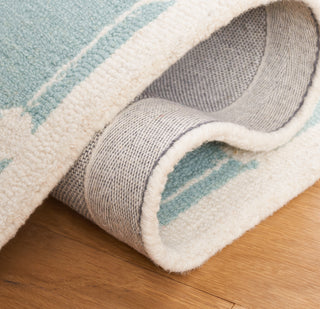 Safavieh Kids SFK927K Turquoise / Ivory Area Rug Detail