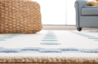 Safavieh Kids SFK930M Ivory / Blue Area Rug Detail
