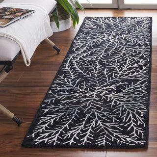 Safavieh Soho SOH257Z Black / Ivory Area Rug Room Scene Feature