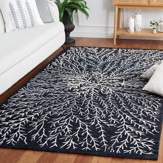 Safavieh Soho SOH257Z Black / Ivory Area Rug Room Scene