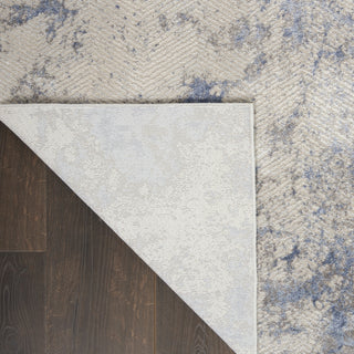 Nourison Silky Textures SLY04 Blue Ivory Grey Area Rug Corner Image