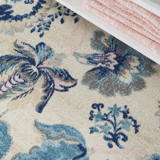 Tranquil TRA02 Ivory/Light Blue Area Rug by Nourison Corner Image
