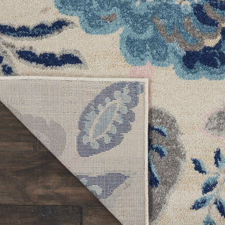 Tranquil TRA02 Ivory/Light Blue Area Rug by Nourison Corner Image
