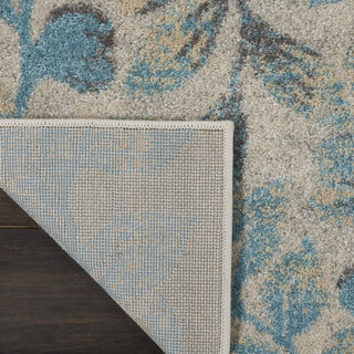 Tranquil TRA03 Ivory/Turquoise Area Rug by Nourison Corner Image