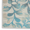 Tranquil TRA03 Ivory/Turquoise Area Rug by Nourison Texture Image