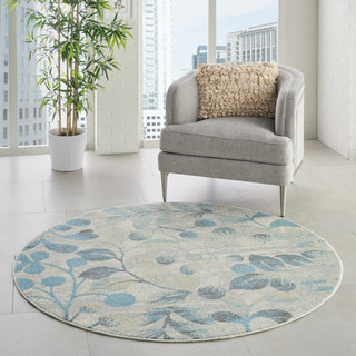 Tranquil TRA03 Ivory/Turquoise Area Rug by Nourison Room Image Feature
