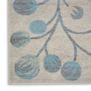 Tranquil TRA03 Ivory/Turquoise Area Rug by Nourison Texture Image