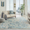 Tranquil TRA03 Ivory/Turquoise Area Rug by Nourison Corner Image