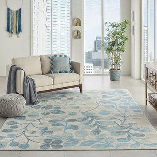 Tranquil TRA03 Ivory/Turquoise Area Rug by Nourison Corner Image