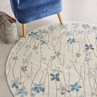 Tranquil TRA04 Ivory Area Rug by Nourison Corner Image