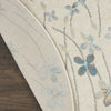 Tranquil TRA04 Ivory Area Rug by Nourison Corner Image