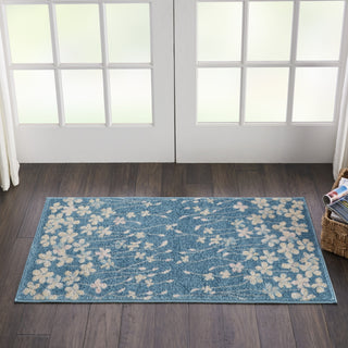 Tranquil TRA04 Turquoise Area Rug by Nourison Corner Image