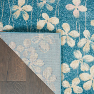 Tranquil TRA04 Turquoise Area Rug by Nourison Corner Image