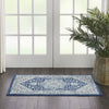 Tranquil TRA06 Ivory/Navy Area Rug by Nourison Corner Image