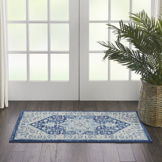Tranquil TRA06 Ivory/Navy Area Rug by Nourison Corner Image