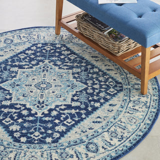 Tranquil TRA06 Ivory/Navy Area Rug by Nourison Corner Image