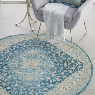 Tranquil TRA07 Ivory/Turquoise Area Rug by Nourison Corner Image