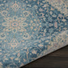 Tranquil TRA07 Ivory/Turquoise Area Rug by Nourison Corner Image