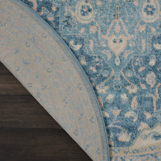 Tranquil TRA07 Ivory/Turquoise Area Rug by Nourison Corner Image