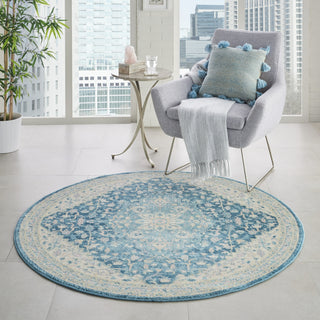 Tranquil TRA07 Ivory/Turquoise Area Rug by Nourison Corner Image