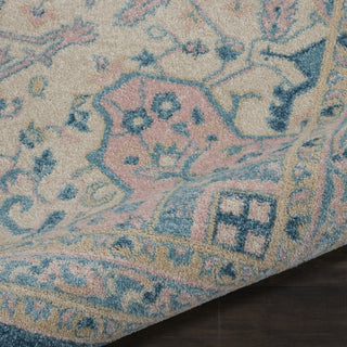 Tranquil TRA07 Ivory/Turquoise Area Rug by Nourison Corner Image