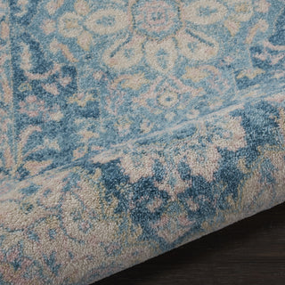 Tranquil TRA07 Ivory/Turquoise Area Rug by Nourison Corner Image