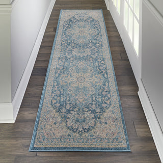 Tranquil TRA07 Ivory/Turquoise Area Rug by Nourison Corner Image