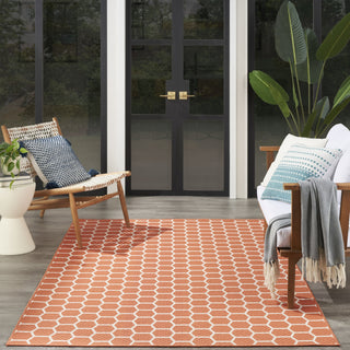 Nourison Twist Reversible TWS01 Coral Machine Washable Area Rug Room Image Feature