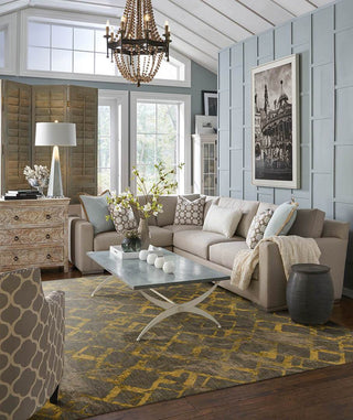 Karastan Cosmopolitan Quartz Brushed Gold Area Rug by Patina Vie Room Scene Featured 