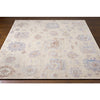 Surya Revere RVE-2301 Area Rug on wood floor