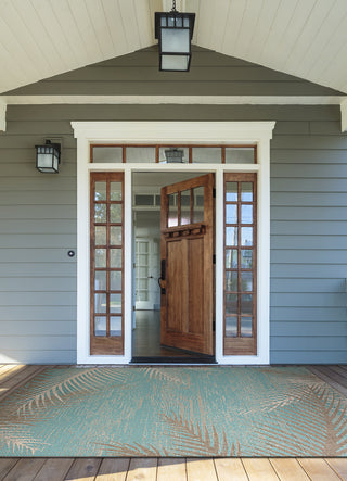 Couristan Monaco Tropical Palms Aqua Area Rug Lifestyle Image Feature