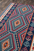 Momeni Baja BAJ31 Red Area Rug Corner Image Feature