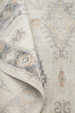 Feizy Kyra 3847F Ivory/Blue Area Rug Corner Image with Rug Pad