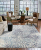 Karastan Expressions Imprinted Blooms Aqua Area Rug by Scott Living Lifestyle Image