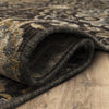 Karastan Relic Caral Black Area Rug Curled 