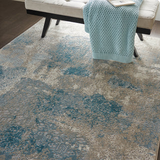 Karma KRM07 Ivory/Light Blue Area Rug by Nourison