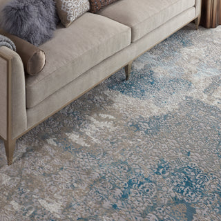 Karma KRM07 Ivory/Light Blue Area Rug by Nourison