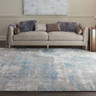 Karma KRM07 Ivory/Light Blue Area Rug by Nourison