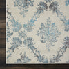 Tranquil TRA09 Ivory/Turquoise Area Rug by Nourison Corner Image