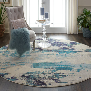 Nourison Celestial CES02 Ivory/Teal Blue Area Rug Round Room Scene 5