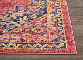 Nourison Passionate PST01 Pink/Flame Area Rug Corner On Wood