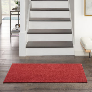 Nourison Essentials NRE01 Brick Red Area Rug Room Scene Feature