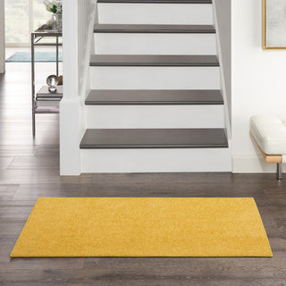 Nourison Essentials NRE01 Yellow Area Rug Room Scene Feature