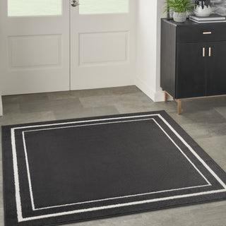 Nourison Essentials NRE02 Black Ivory Area Rug Room Image