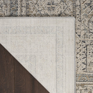 Nourison Nyle NYE01 Ivory/Grey/Blue Area Rug Corner Image